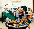 Ensemble "Fleur de Teranga" : Pochette à Rabat et Éventail Artisanal Assortis